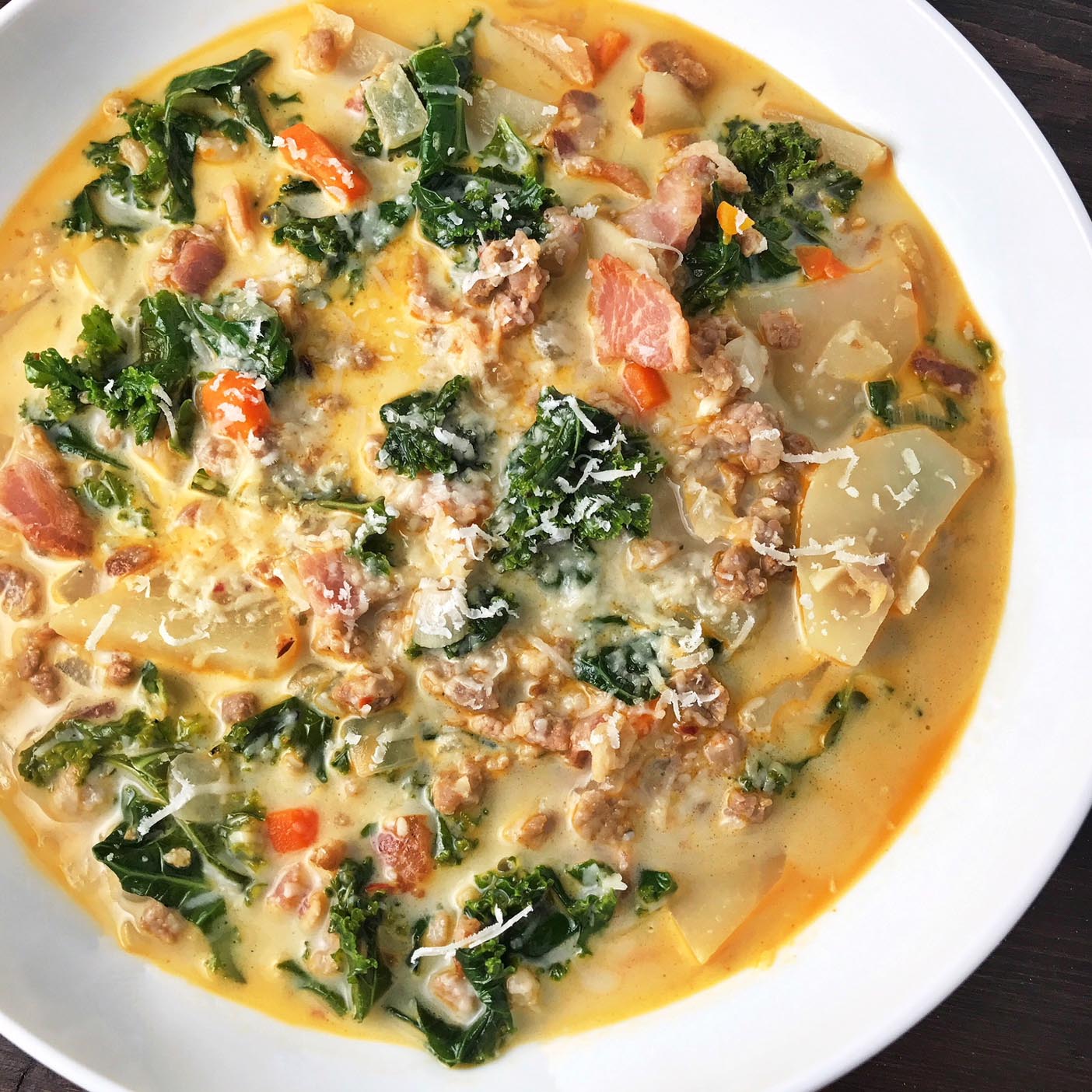 Sausage and Kale soup in a bowl