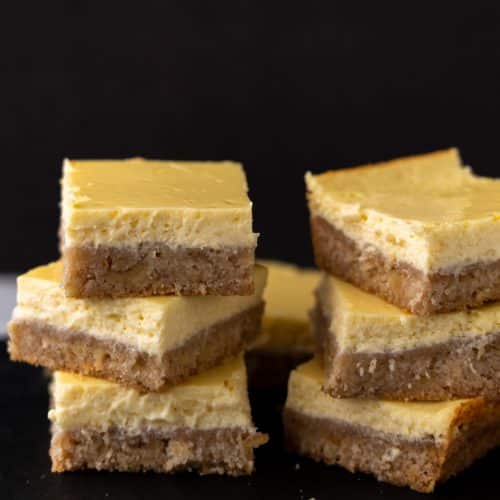 cheesecake squares stacked on each other
