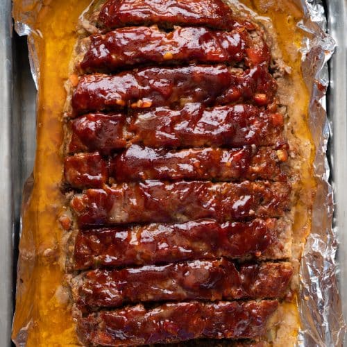 beef and pork meatloaf topped with a Chipotle Ketchup glaze in a tray