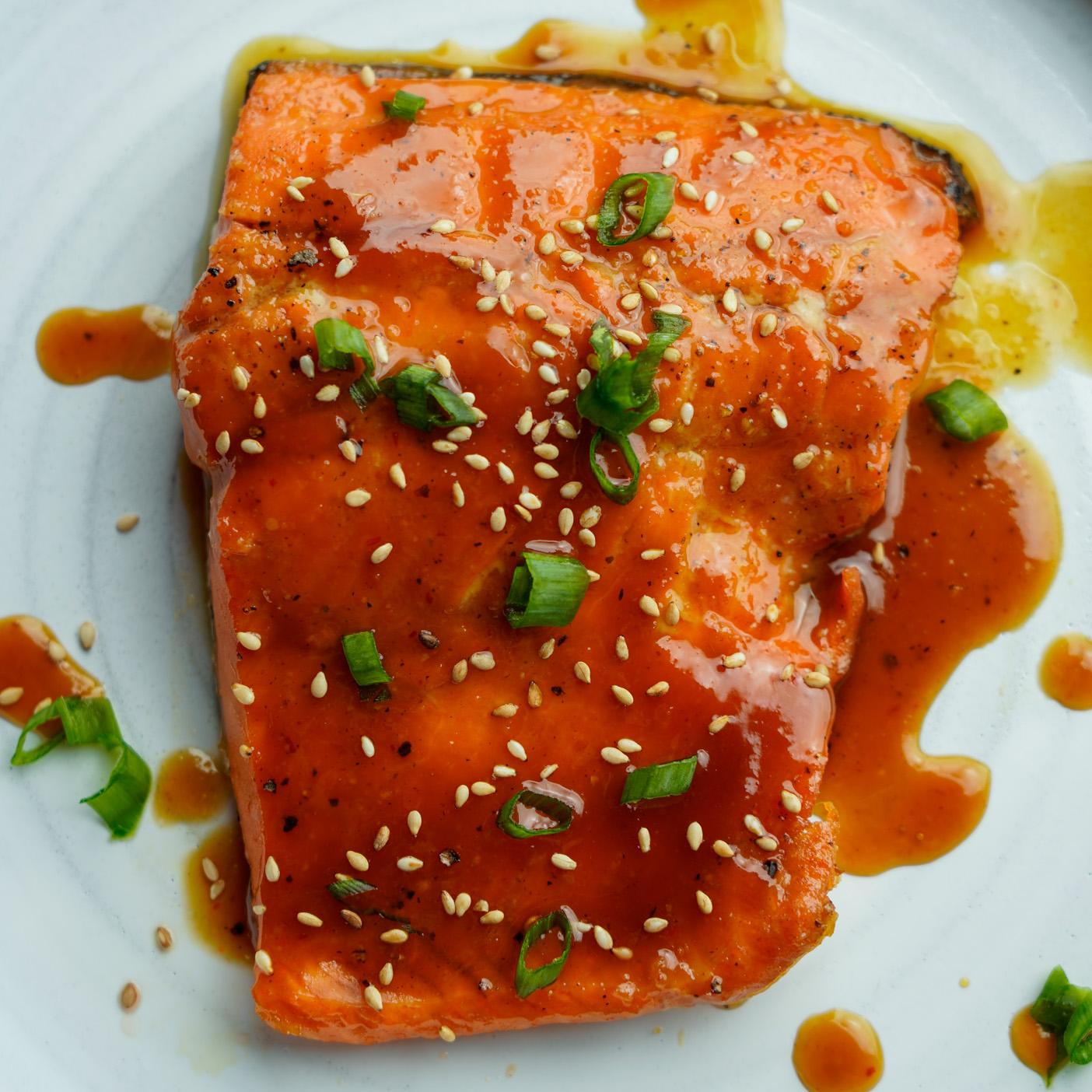 Salmon Filet with Glaze on a white plate
